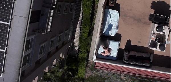  Drone films rooftop sex